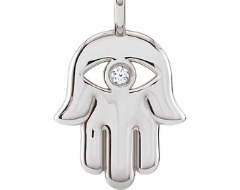 May include: Silver charm in the shape of a hamsa hand with a single diamond in the center of the eye.