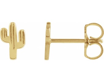 May include: A pair of gold cactus stud earrings. The earrings are small and delicate, and they feature a simple cactus design.
