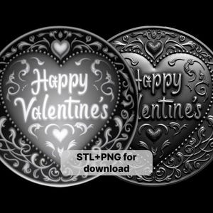 May include: Two black metal heart-shaped ornaments with intricate floral designs. The ornaments feature the text "Happy Valentine's" in white lettering.