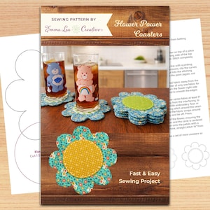 May include: A sewing pattern for flower-shaped coasters. The image shows finished coasters with blue floral fabric and yellow centers, alongside glasses with cartoon characters. The pattern is labeled "Flower Power Coasters" and "Fast & Easy Sewing Project."