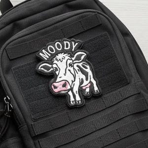 Moody Cow Embroidered Patch 3x2.5 Inch Hook & Loop Funny Animal Morale Patch for Jackets, Backpacks and Gear