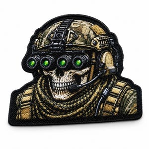 May include: An embroidered patch featuring a skull wearing a camouflage tactical helmet with four green-lensed night vision goggles, a headset with a microphone, and a tan scarf, all outlined in a thick black border on a dark background.
