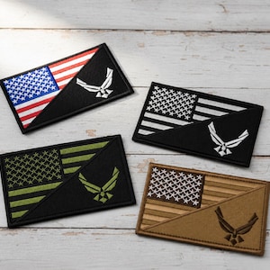 May include: Four rectangular embroidered patches featuring a split design with a United States flag on the left and the United States Air Force logo on the right. The patches come in full color, black and white, olive green, and tan color schemes.