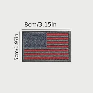 May include: A rectangular embroidered patch featuring the United States flag in muted red, white, and dark blue tones. The patch measures 8 inches by 3.15 inches and 5 inches by 1.97 inches as indicated by the text labels on the image.