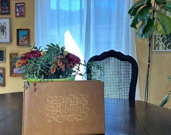 vintage light brown postcard album