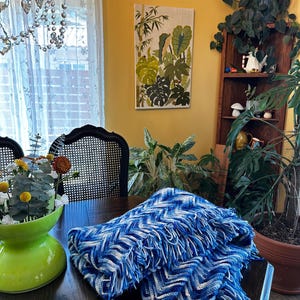 vintage blue and white crochet afghan with fringe