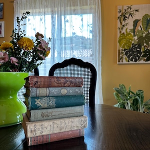 three antique books