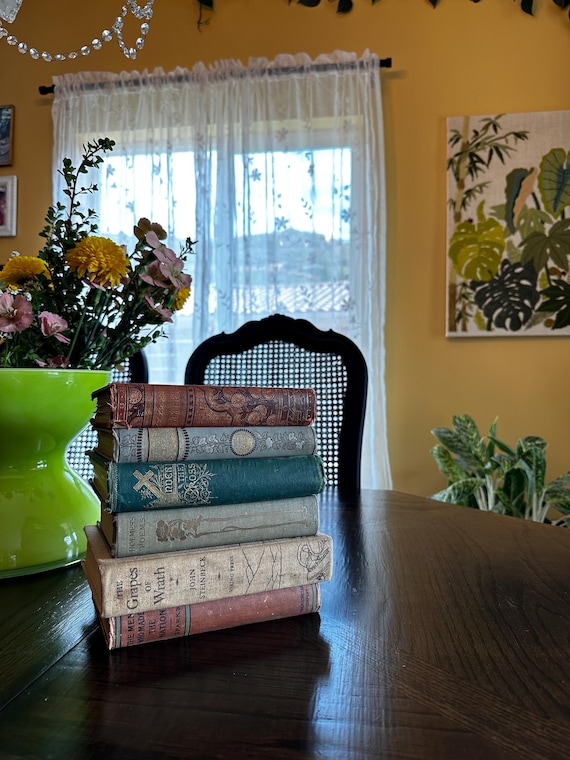 three antique books