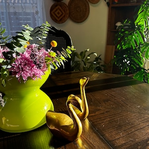 two vintage brass swans