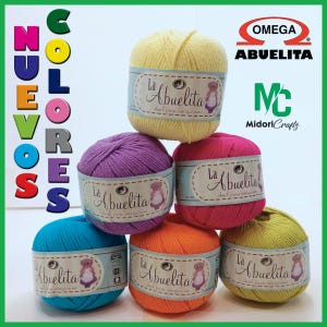 May include: A stack of colorful yarn balls in yellow, purple, pink, blue, orange, and green. Each ball has a label with the text "La Abuelita" and a teddy bear illustration. The image also includes the text "Nuevos Colores".