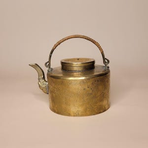 Vintage Brass Teapot with Engraved Asian Figures - Woven Handle - Decorative Antique Kettle - Oriental Brass Decor - Collectible Tea ware