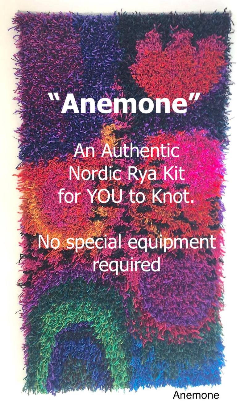 May include: A colorful textile art piece with the word "Anemone" in white. The piece features a mix of vibrant colors including purple, red, orange, and green. Text on the piece reads "An Authentic Nordic Rya Kit for YOU to Knot."