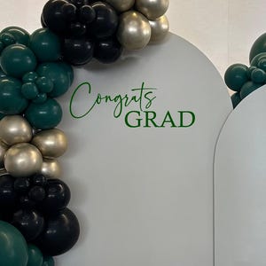 Graduation decal shown  on 7' arch - Text Congrats Grad with balloons decor