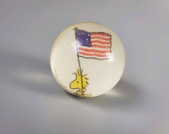 Vintage Peanuts Woodstock met rubberen springbal met Amerikaanse vlag