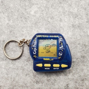 Giga Pet Vintage - Tamagotchi Giga Faces - Occasion - Fonctionne