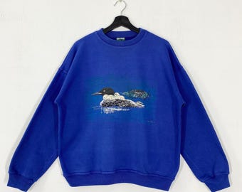Vintage des années 90 Outdoor Outfitters sweat-shirt ras du cou pull faune aigle-loup ours canard Habitat impression logo bleu moyen