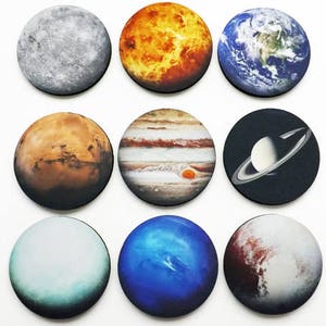 May include: Nine round coasters featuring images of planets in our solar system. The coasters are made of a cork-like material and feature images of Mercury, Venus, Earth, Mars, Jupiter, Saturn, Uranus, Neptune, and Pluto.