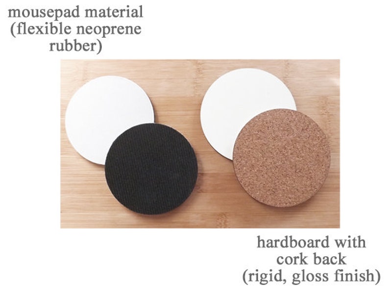 May include: Two round mousepads, one made of flexible neoprene rubber and the other made of hardboard with a cork back. The neoprene mousepad is black and the hardboard mousepad is brown.