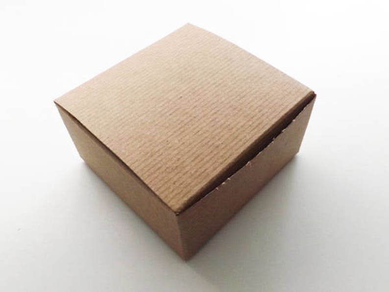 May include: A plain brown cardboard box with a textured surface.