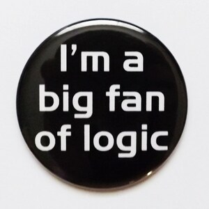 May include: A black button with white text that reads "I'm a big fan of logic".