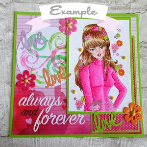 May include: A pink and green card with a girl with brown hair and a pink sweater. The card has the words "love always and forever" on it.