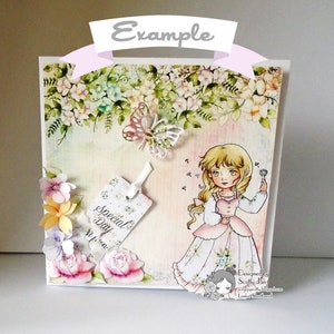 May include: A handmade card with a floral design and a girl blowing on a dandelion. The card has a tag that says "Special Day" and is decorated with flowers and a butterfly.