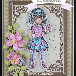 May include: A colorful card with a cartoon girl holding a pink drink. The girl has long gray hair, a pink shirt, and blue and pink striped tights. The card has a brown background with a white border and a pink ribbon with the word "Example" on it. The card also has a green floral design and the words "Spiral Creativity" at the bottom.