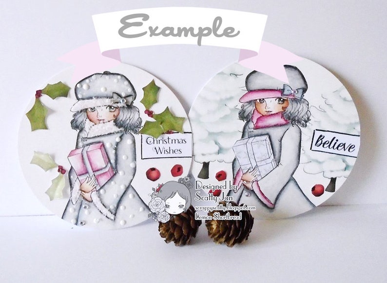 May include: Two round Christmas ornaments featuring illustrations of girls in winter clothing holding gifts. One ornament has the text "Christmas Wishes" and the other has the text "Believe".