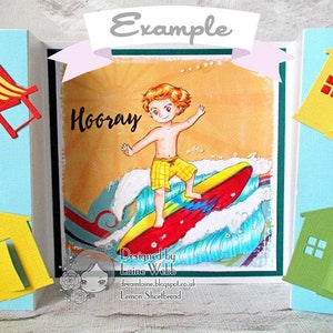 May include: A colorful card with a boy surfing on a wave. The card has a beach theme with yellow and green beach houses, a blue and white striped beach chair, and the word "Hooray" written on the front. The card is designed by Laine Webb.