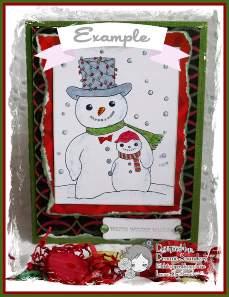 May include: A green card with a white border and a red and black patterned border. The card features a hand-drawn illustration of two snowmen. The larger snowman is wearing a gray top hat with red and green lights, a red bow tie, and a green scarf. The smaller snowman is wearing a red hat and a red and white striped scarf. The card has the text "Example" at the top and "warm winter wishes" at the bottom. The card also has the text "Designed by Deanne Saunders" and "littlepaper-blogspot.com Lemon Shortbread" at the bottom.