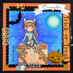 May include: A Halloween-themed card with a cartoon cat dressed in a gray catsuit sitting on a brick wall. The card has a blue background with white stars and a full moon. The text "Trick-or-Treat" is written on the right side of the card. The card also has a pumpkin with a jack-o'-lantern face.