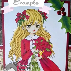 May include: A Christmas card featuring a cartoon illustration of a girl with long blonde hair wearing a red dress and holding a poinsettia. The card has a white background with a red border and the text "Example" at the top. The text "Designed by Sarah Bell" and a website address are at the bottom.