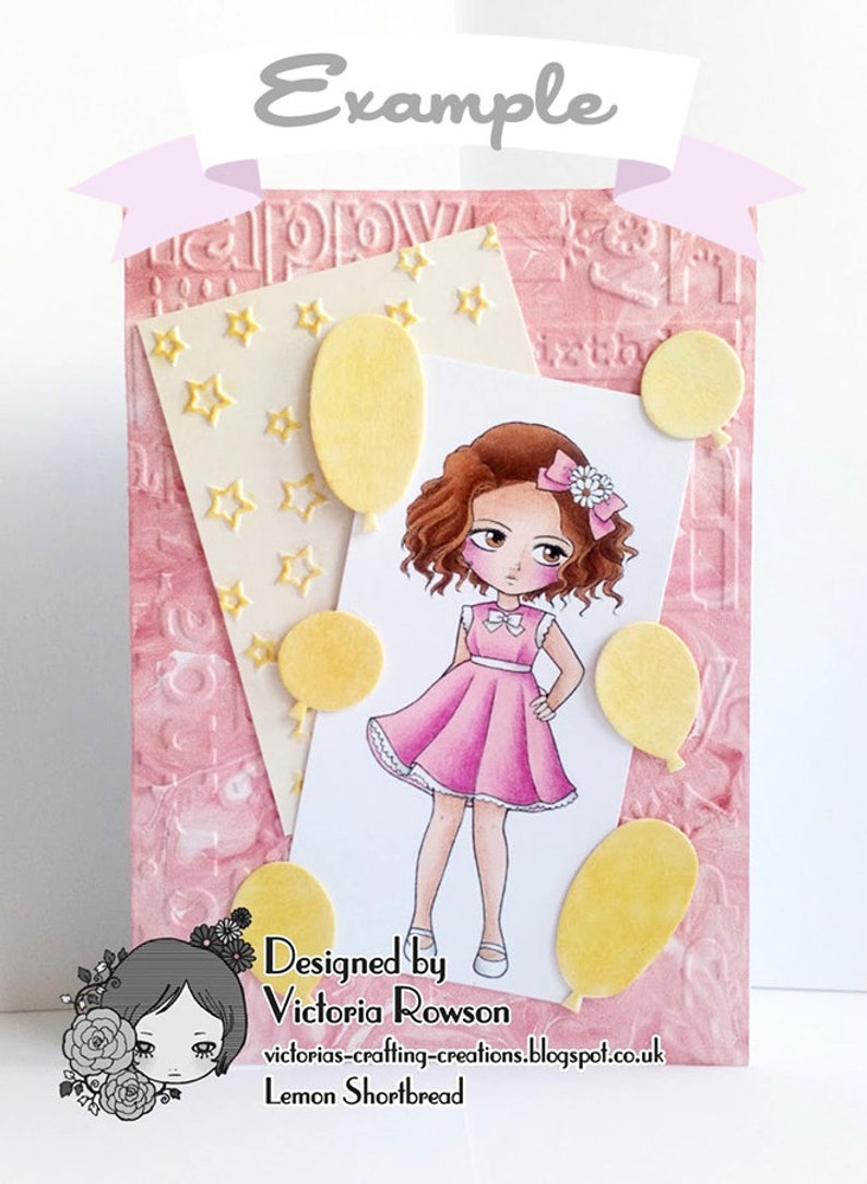 May include: A pink and white card featuring a cartoon girl in a pink dress with a white bow in her hair. The card has a yellow background with white stars and yellow balloons. The text on the card reads "Designed by Victoria Rowson" and "victorias-crafting-creations.blogspot.co.uk".