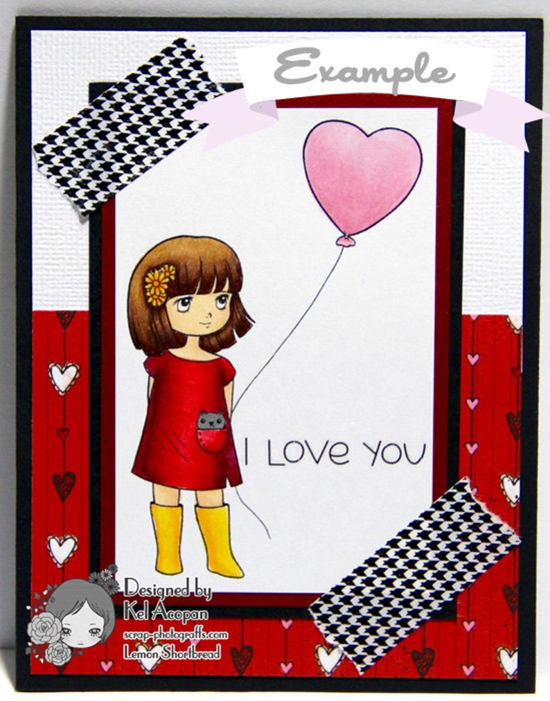 May include: A red and white card with a black and white checkered pattern on the top and bottom. The card features a cartoon girl holding a pink heart-shaped balloon. The text "I Love You" is written on the card. The card is designed by Kel Acopan.
