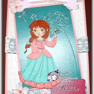 May include: A pink and teal birthday card with a girl holding a dandelion and a pink banner that says "On Your Birthday".