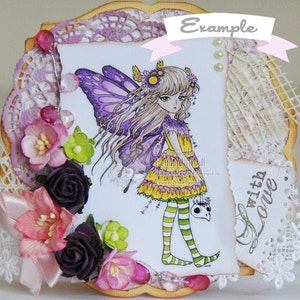 May include: A handmade card featuring a purple and yellow fairy illustration, a lace doily, and the text "Example" and "With Love".