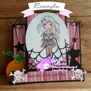 May include: A Halloween-themed card with a black and white illustration of a girl with a wand and a spider web. The card has a pink and white striped background and the text "have a be-witching good time."