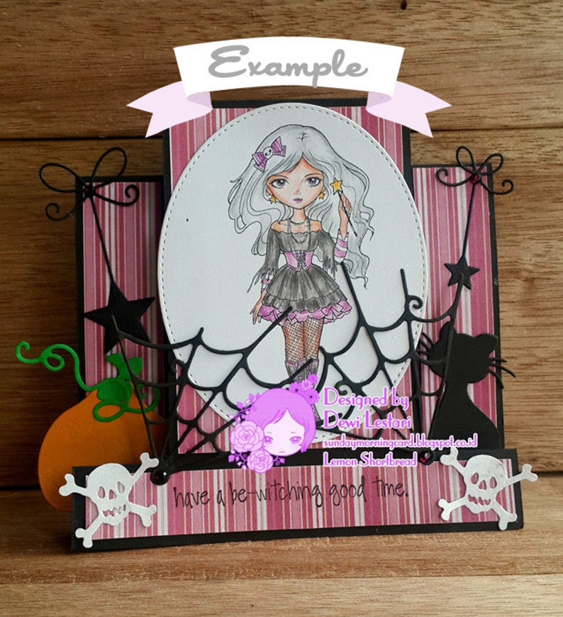 May include: A Halloween-themed card with a black and white illustration of a girl with a wand and a spider web. The card has a pink and white striped background and the text "have a be-witching good time."