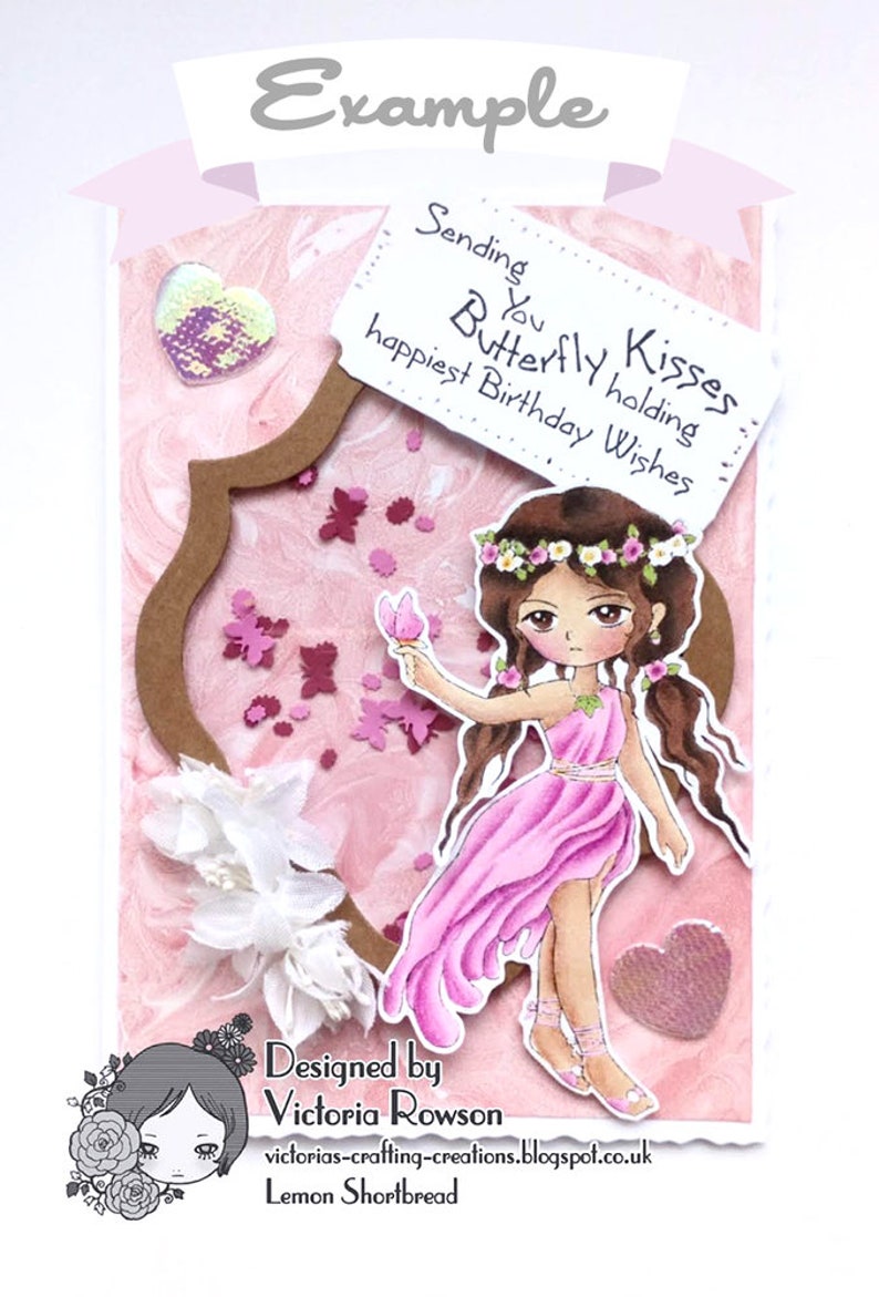 May include: A pink and brown card featuring a butterfly holding a sign that reads "Sending you Butterfly Kisses holding happiest Birthday Wishes". The card is decorated with flowers, butterflies, and glitter. The card is designed by Victoria Rowson and is called "Lemon Shortbread".