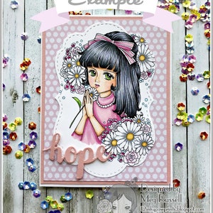 May include: A pink and white card with a girl holding a bouquet of white daisies. The card has a pink polka dot background and the word "hope" written in pink script. The card is designed by Meg Russell and features the text "Lemon Shortbread".