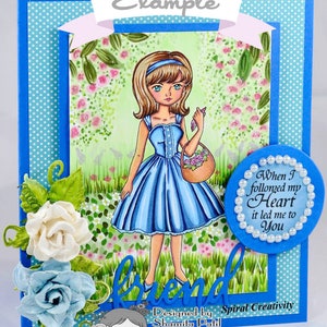 Peut inclure: Une carte bleue avec un motif de pois blancs et une bordure bleue. La carte pr&eacute;sente une illustration dessin&eacute;e &agrave; la main d'une fille en robe bleue tenant un panier de fleurs. Le texte "When I followed my Heart it led me to You" est &eacute;crit dans un cercle avec une bordure de perles. Le texte "Designed by Spiral Creativity Shamita Patil spiralcreativity.blogspot.com Lemon Shortbread" est &eacute;crit en bas de la carte.