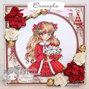 May include: A Christmas card featuring a girl with long blonde hair wearing a red dress and holding a poinsettia. The card is decorated with red and white flowers, gold ornaments, and a small Christmas tree charm.