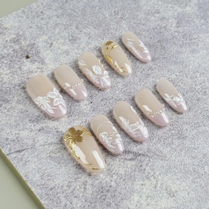 Pink Gradient Almond Fake Nails with White Floral Patterns, Golden Lines and Pearls, Press On Nails Perfect for Weddings and Elegant Looks