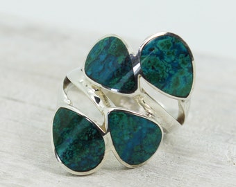 A stunning Chrysocolla ring with four teardrop shape natural Chrysocolla stone from Peru set on 925 sterling silver and confortable