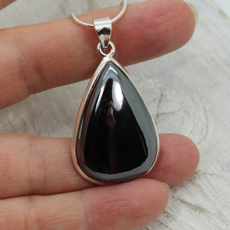 Hematite stone pendant teardrop shape all natural cabochon silver color shiny stone set on sterling silver 925 mount natural quality jewelry