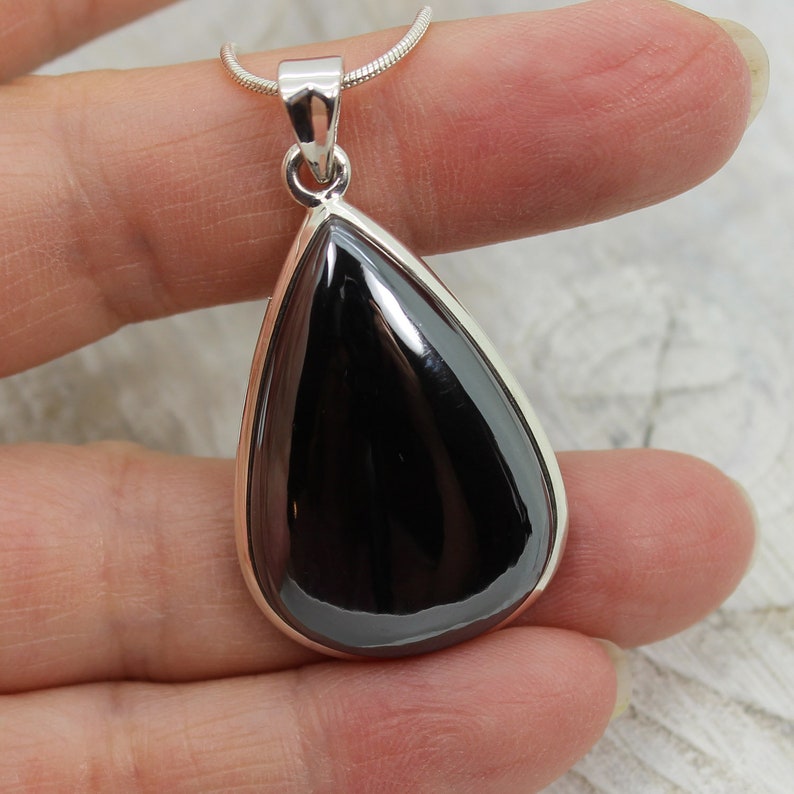 Hematite stone pendant teardrop shape all natural cabochon silver color shiny stone set on sterling silver 925 mount natural quality jewelry