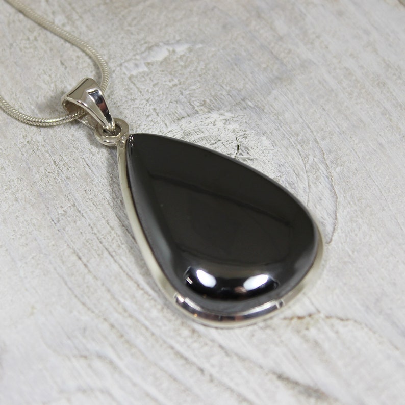 Hematite stone pendant teardrop shape all natural cabochon silver color shiny stone set on sterling silver 925 mount natural quality jewelry