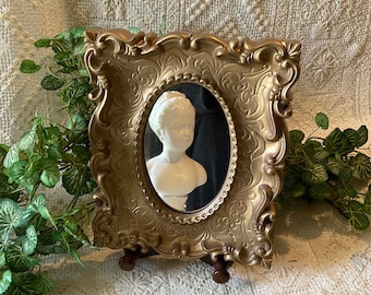 Oval Mirror in Scrolly Plastic Gold Frame