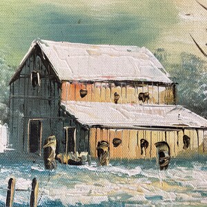 May include: Oil painting of a snow-covered barn with a weathered wooden exterior. The roof is white with snow, and the building has several small openings. A fence is visible in the foreground, and the background features a light green sky and trees.