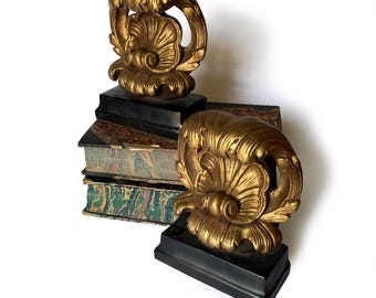 Pair Of Gold Borghese Acanthus Shells Bookends On Black Bases Architectural Design